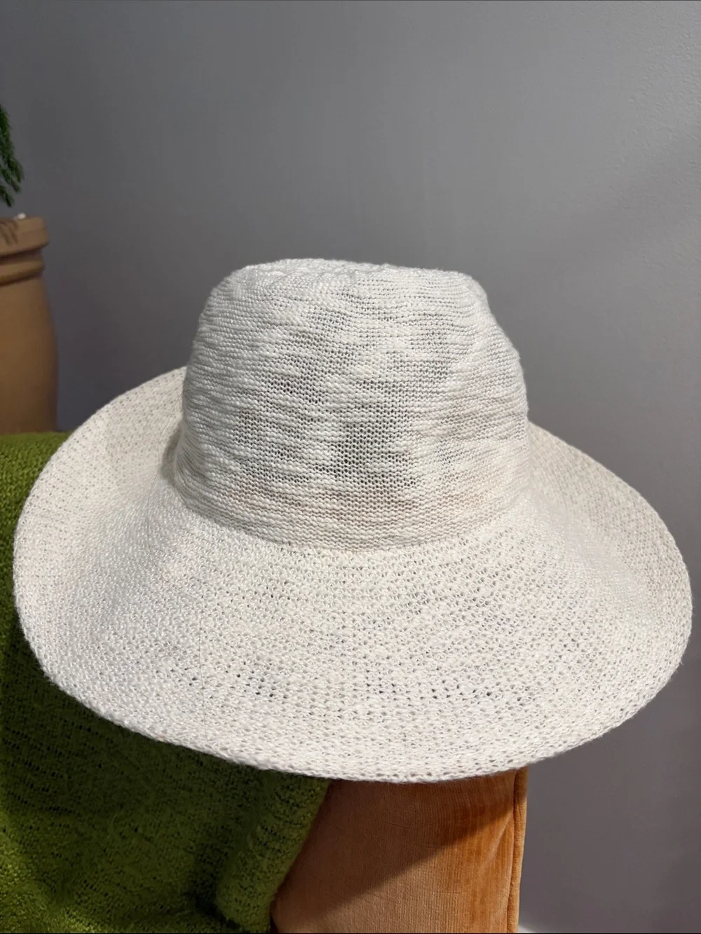 Cream Knit Wide-Brim Sun Hat with Decorative Medallion